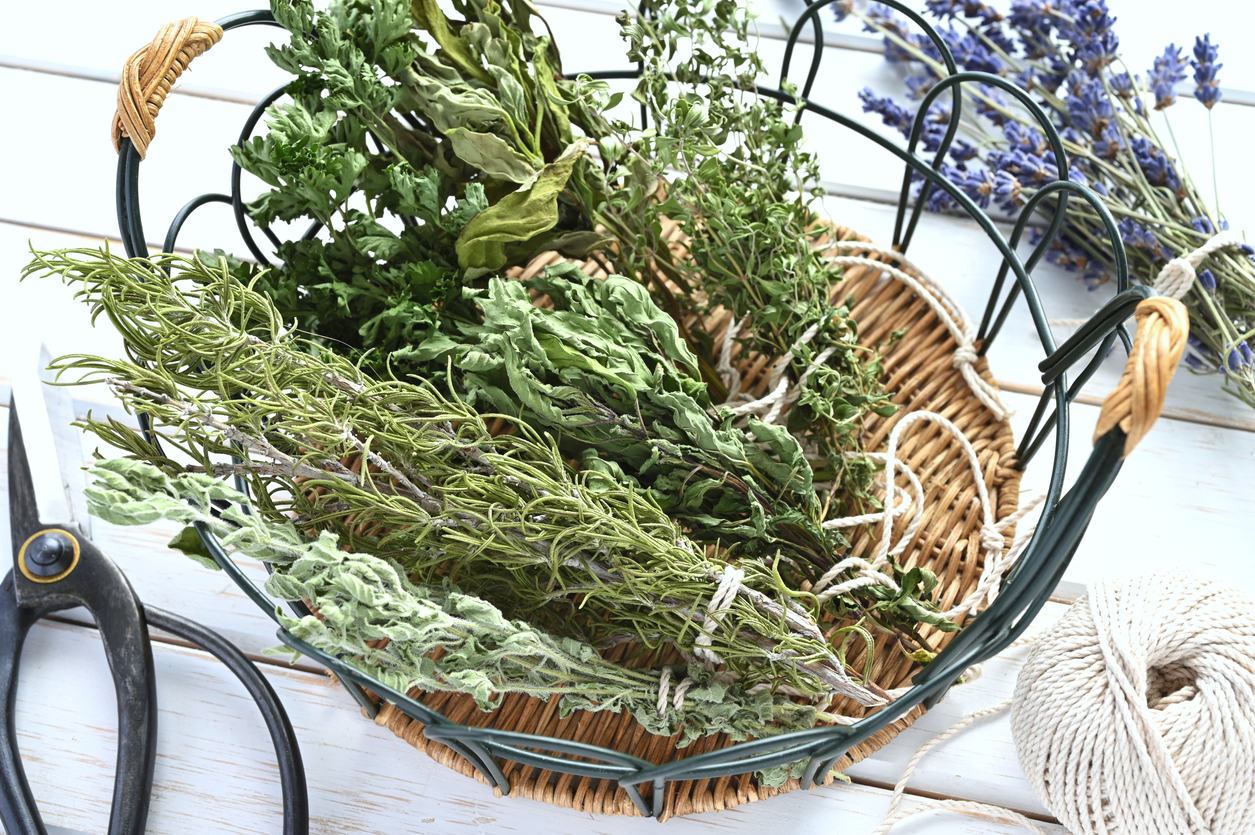 Mixed dried herbs in a wicker basket